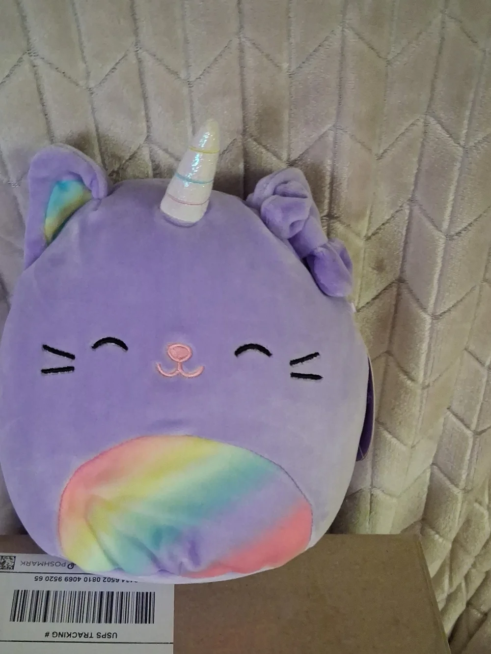 Squishmallows Cienna The Purple Unicorn Cat with Pastel Rainbow Belly.